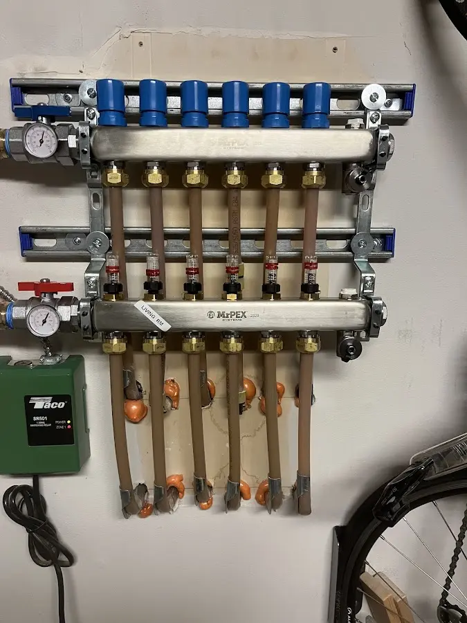 Plumber performing Water Heater Repair at a residential property in Echols County